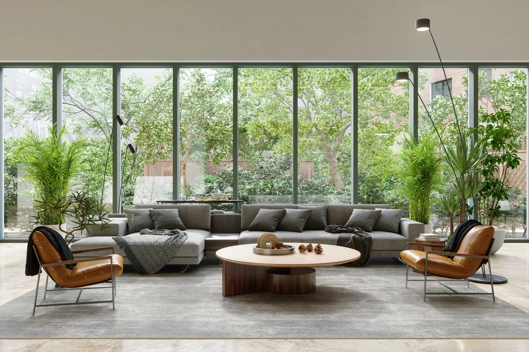 The Halcyon Residences amenity lounge with floor-to-ceiling forest views